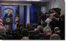 Members of the White House media focus their cameras on President George W. Bush Thursday, Sept. 20, 2007, during a morning press conference in the James S. Brady Briefing Room of the White House. White House photo by Chris Greenberg