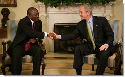 President George W. Bush welcomes President Joseph Kabila of the Democratic Republic of Congo to the Oval Office Friday, Oct. 26, 2007. Among the topics the leaders discussed during the visit were the successes of the newly elected Kabila government and the remaining challenges to a secure and prosperous Congo.  White House photo by Eric Draper