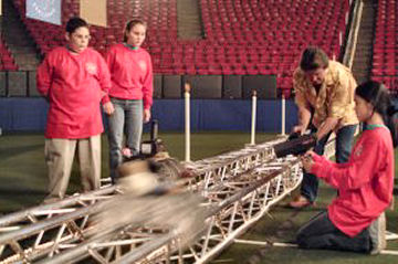 Nick Ekladyous (far left) and teammates explored Albert Einstein's theory of relativity at the DCYSC in 2004.