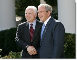 President George W. Bush and Senator John McCain (R-Ariz.) shake hands as they deliver a statement Wednesday, March 5, 2008, in the Rose Garden of the White House. Said the President in his endorsement of Senator McCain, "John showed incredible courage and strength of character and perseverance in order to get to this moment. And that's exactly what we need in a President."  White House photo by Chris Greenberg