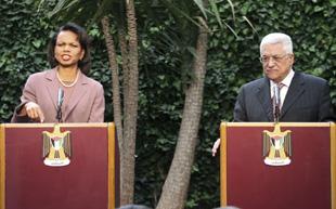 U.S. Secretary of State Condoleezza Rice (L) and Palestinian President Mahmoud Abbas attend a joint news conference in Amman March 31, 2008. (Xinhua/Reuters Photo)