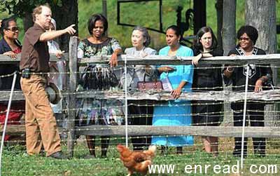 Michelle Obama and other first ladies get a tour of the chicken coop area during a visit to Stone Barns Center.