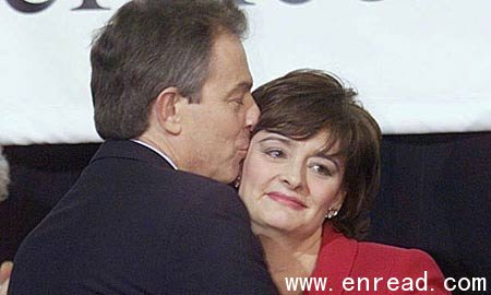 'I was an animal' ... Tony Blair kisses Cherie.