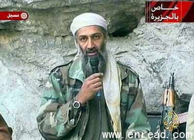 The image made from video broadcast on Sunday, Oct 7, 2001 shows Osama bin Laden at an undisclosed location.