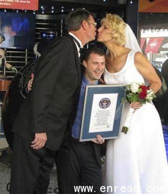 Wayne Hallquist, 6 feet 10.4 inches tall and his wife Laurie Hallquist, 6 feet 5.95 inches from Stockton, California appear at an event in Hollywood to form Guinness World Record’s new “Tallest Married Couple” in Hollywood, California November 18, 2010.