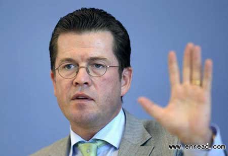 German Defence Minister Karl-Theodor zu Guttenberg answers citizens questions during visitors day in the house of the Federal Press Conference (Bundespressekonferenz) in Berlin in this Aug 22, 2010 file photo.