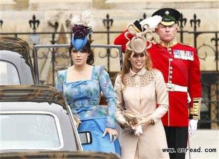 Britain's Princess Eugenie (L) and Princess Beatrice arrive at Westminster Abbey before the wedding of Britain's Prince William and Kate Middleton, in central London April 29, 2011.