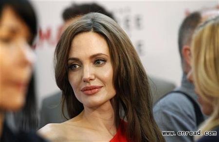 Actress Angelina Jolie attends the premiere of “The Tree of Life” at LACMA in Los Angeles May 24, 2011. The movie opens limitedly in the U.S. on May 27.