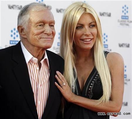 Hugh Hefner and his fiancee, Playboy Playmate Crystal Harris, arrive at the opening night gala of the 2011 TCM Classic Film Festival featuring a screening of a restoration of 'An American In Paris' in Hollywood, California April 28, 2011.