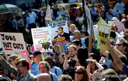 Hundreds of protesters streamed through midtown Manhattan on Tuesday in what they called a 'Millionaires March.'