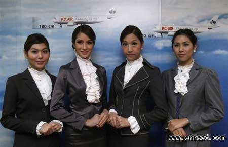 Thai transsexual ladyboys are taking to the air as flight attendants for a new airline.