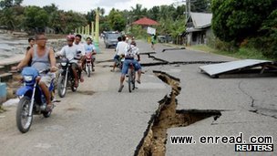 Damaged roads and bridges pose challenges for rescue workers and the transport of aid