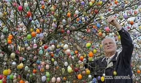 You thought Easter eggs don\t grow on trees? Check out Volker Kraft\s garden in eastern Germany, and think again.