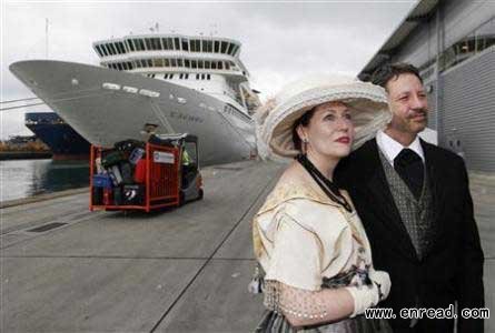 Newlyweds Mary Beth Crocker Dearing (L) and Tom Dearing of Newport, Kentucky, wearing period costume, wait to be interviewed before boarding the Titanic Memorial Cruise in Southampton, England April 8, 2012.