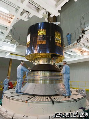 Meteosat-10 (MSG-3) being placed on top of its Ariane launcher
