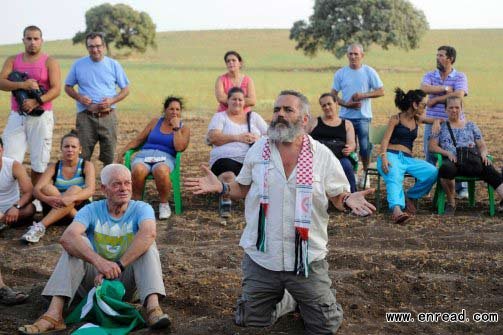 Juan Manuel Sanchez Gordillo (C), mayor of Marinaleda and member of the regional Andalusian parliament representing the United Left (IU) party, talks with <a href=