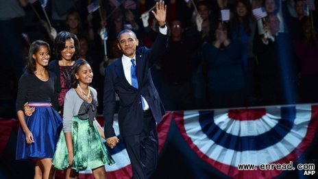   Flanked by his family, Obama greeted ecstatic supporters in Chicago