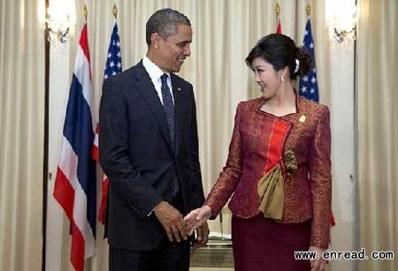 The president and Prime Minister Yingluck Shinawatra could be seen laughing together and exchanging playful glances through a state dinner.