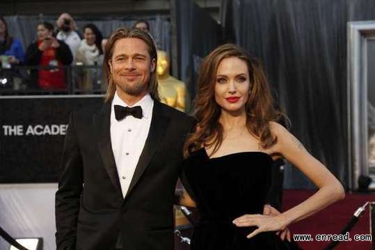 Brad Pitt and Angelina Jolie make their entrance during the 66th annual Golden Globe Awards in February 2012.