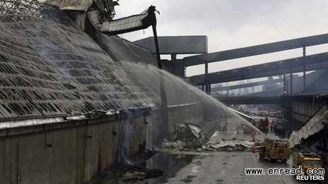 Port authorities say the fire began in one of the overhead conveyor belts taking sugar into the warehouses
