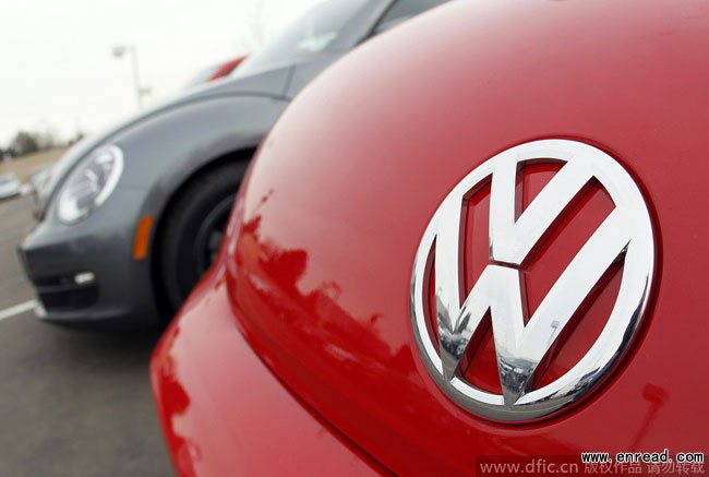 This Feb, 19, 2012 file picture shows the Volkswagen logo on the hood of a 2012 Beetle at a Volkswagen dealership in the south Denver suburb of Littleton, Colorado.