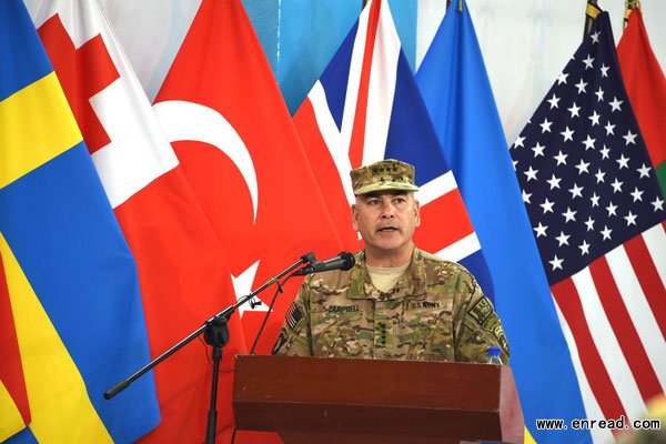 US General John Campbell speaks during a ceremony marking the end of ISAF\s combat mission in Afghanistan at ISAF headquarters in Kabul on December 28, 2014.