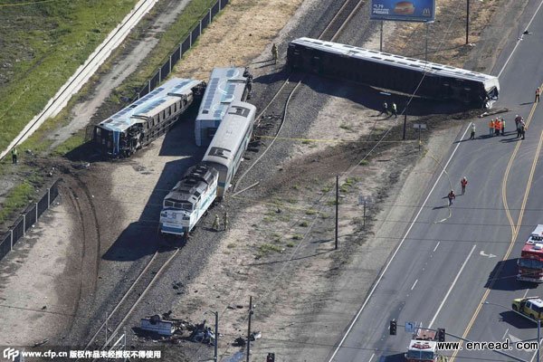 An aerial view shows the scene of a double-decker Metrolink train derailment in Oxnard, California on February 24, 2015.