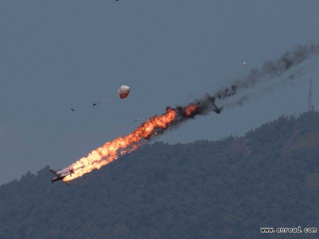Two planes from Indonesia's Jupiter aerobatics team crash during a practice session on March 15, 2015.