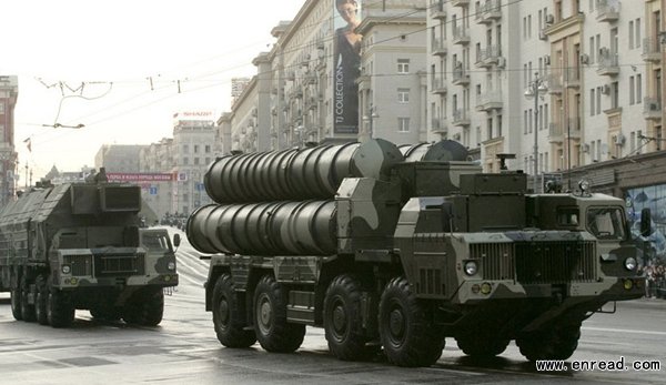 Russian S-300 anti-missile rocket system move along a central street during a <a href=