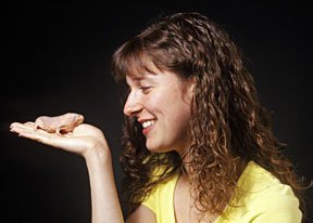 Naked mole rats can live a long time. Twenty-one-year-old Cornell University student Dara Neumann holds a mole rat that was born years before she was.