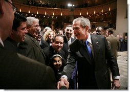 President George W. Bush shakes hands with audience members following his remarks to United States Hispanic Chamber of Commerce, speaking on Western Hemisphere policy, Monday, March 5, 2007 in Washington, D.C.  White House photo by Paul Morse