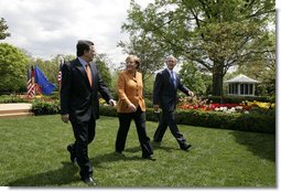 President George W. Bush and European Council President Angela Merkel of Germany , and European Commission President Jose Manuel Barroso of Portugal leave the Rose Garden Monday, April 30, 2007, after their joint press conference. White House photo by Eric Draper