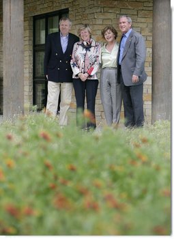 President George W. Bush and Laura Bush stand with NATO Secretary-General Jaap de Hoop Scheffer and his wife Jeannine de Hoop Scheffer Monday, May 21, 2007, at the Bush Ranch in Crawford, Texas. "The Secretary General of NATO has been a strong advocate of fighting terror, spreading freedom, helping the oppressed and modernizing this important alliance," said the President in his remarks to the press. White House photo by Eric Draper