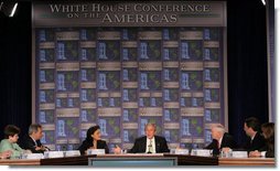 President George W. Bush responds to a question Monday, July 9, 2007, during A Conversation on the Americas in Arlington, Va. The President and Mrs. Laura Bush are hosting the conference to highlight United States engagement and discuss more effective ways to deliver aid and strengthen civil society. White House photo by Chris Greenberg