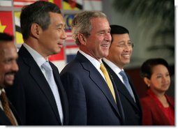 President George W. Bush smiles as he stands for a group photo with Southeast Asian Leaders Friday, Sept. 7, 2007, following a luncheon at the InterContinental in Sydney. Standing with him are Prime Minister Lee Hsien Loong of Singapore, left, Noer Hassan Wirajuda, Indonesian Minister of Foreign Affairs, and President Gloria Macapagal-Arroyo of the Philippines. White House photo by Eric Draper